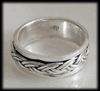 6.2 mm. Liten flätad Spinner ring i Äkta silver.